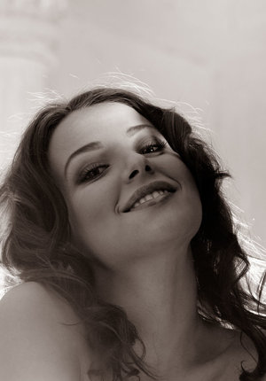 18 year old girl Katie Lewis stands naked after undressing in her bedroom